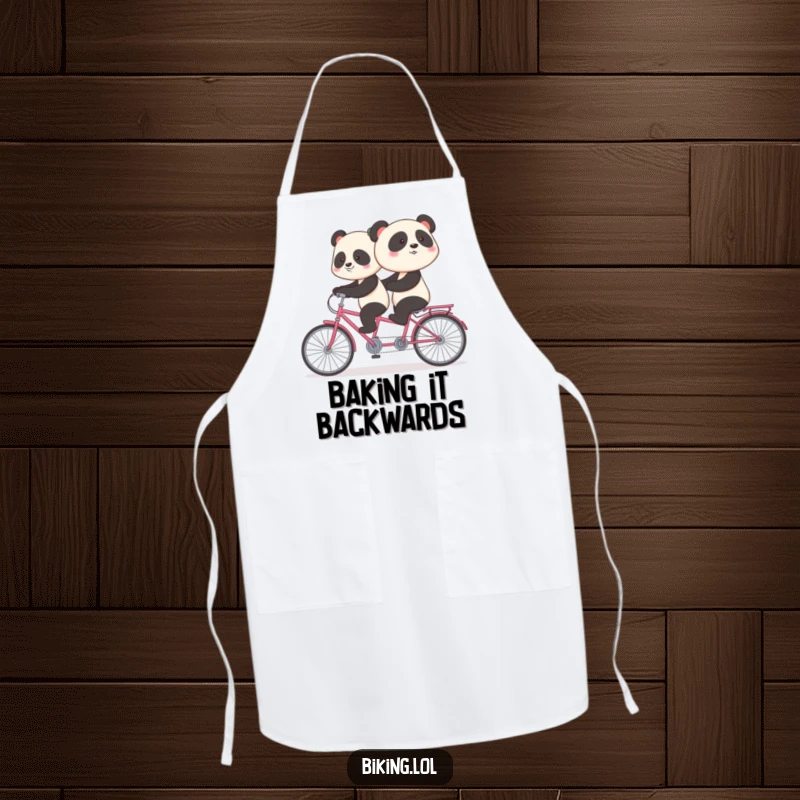 Funny panda apron depicting a shy panda pedaling backward on a tandem bike, ideal for kitchen humor and cooking enthusiasts.