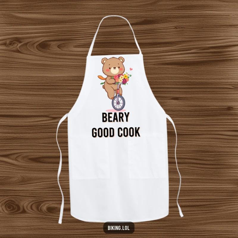 Funny bear apron with a determined bear riding a unicycle, holding a bouquet of flowers, perfect for kitchen use.