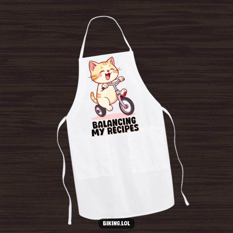 Funny apron with a smiling cat enthusiastically pedaling a unicycle, adding a humorous touch to kitchen activities with a theme of balance.