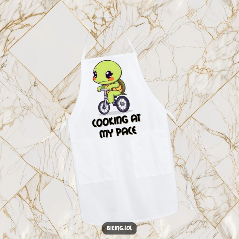Funny determined turtle character slowly pedaling a unicycle, printed on a functional kitchen apron.