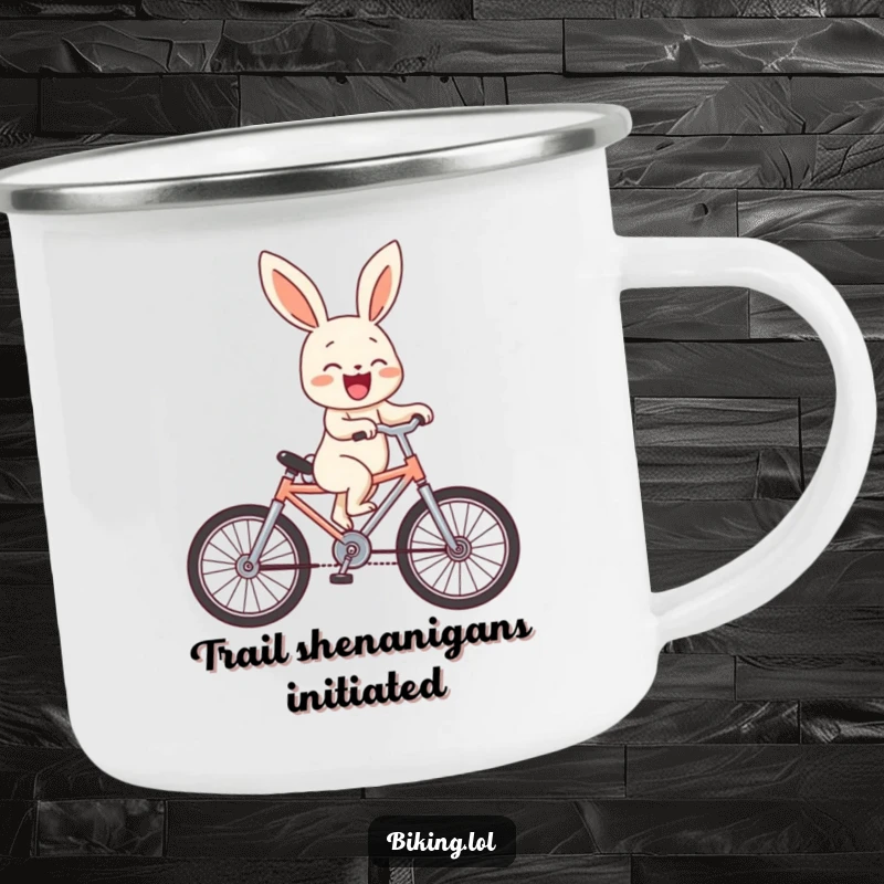 Funny bunny character laughing while attempting a wheelie on a tiny bicycle, designed for a durable camping mug.