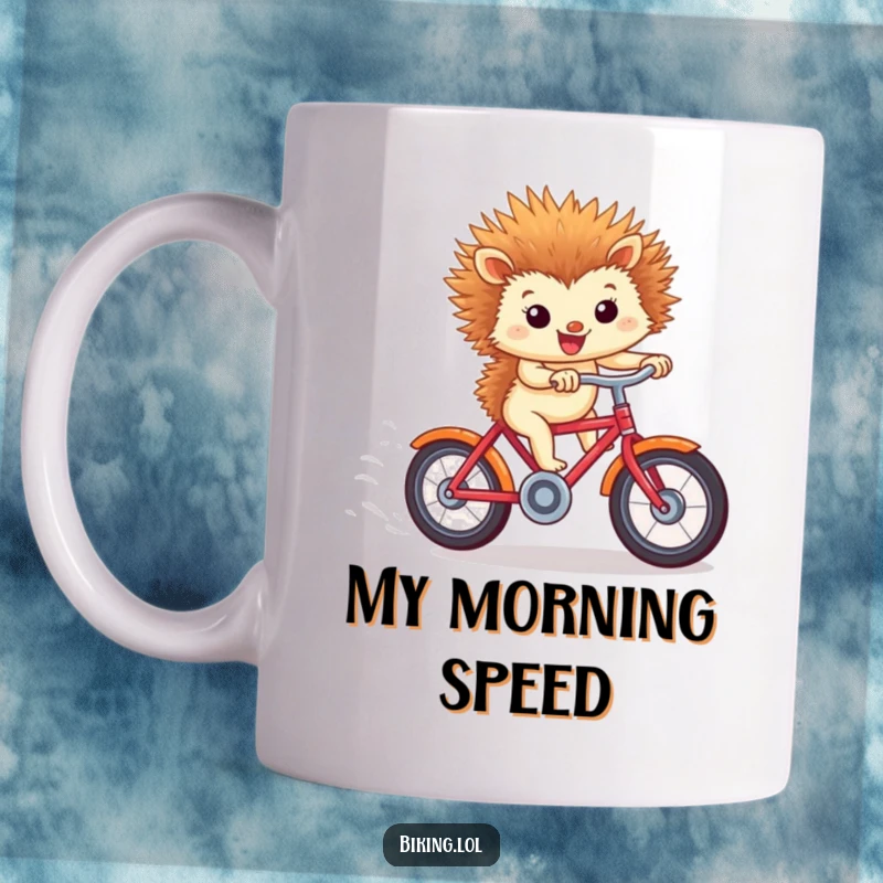 Funny hedgehog mug showing a tiny critter speeding downhill on a red bike, ears flapping, perfect for a funny gift.