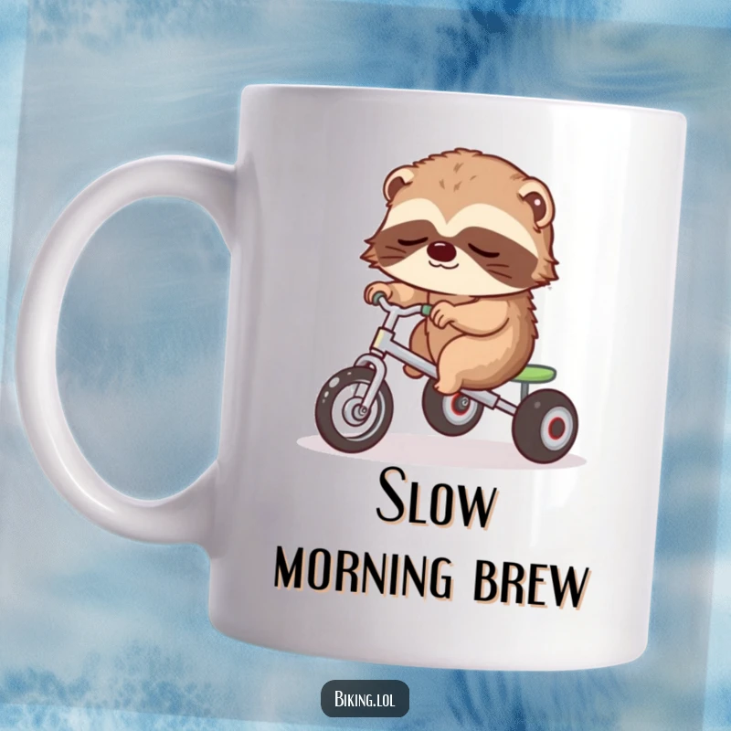 Funny mug featuring a sleepy sloth slowly pedaling a tiny tricycle, embodying relaxation.
