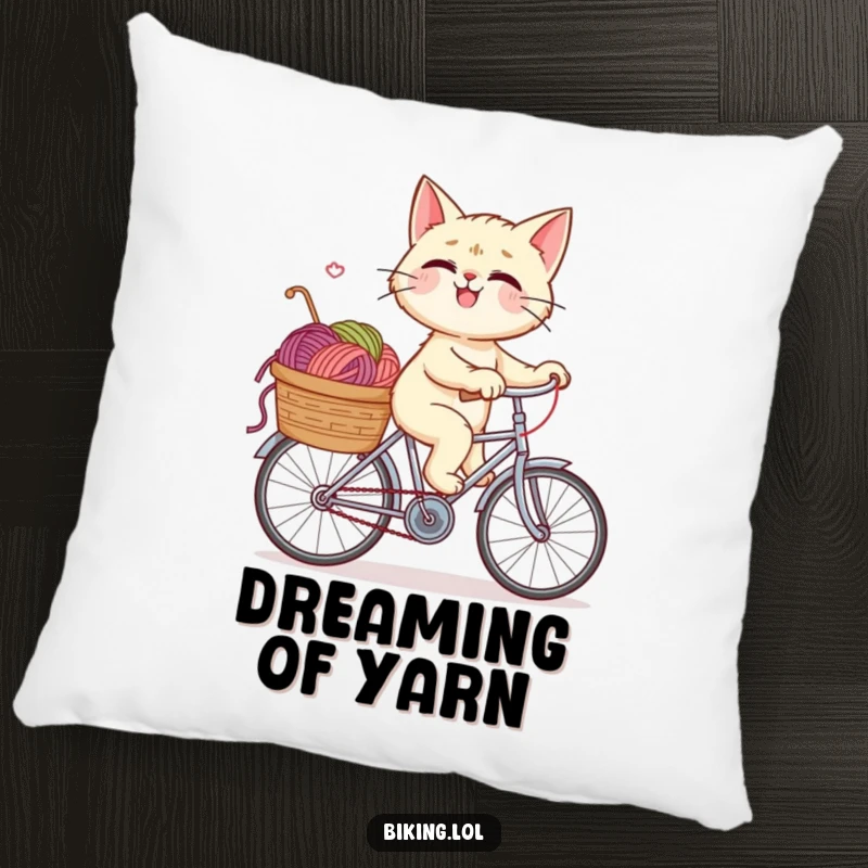 Funny pillow featuring a plush armchair comfort, centered around a giggling cat riding a bicycle surrounded by its beloved yarn.