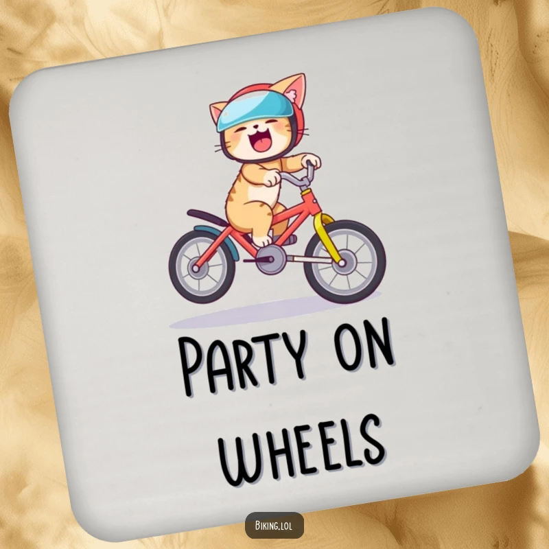 Funny cat coaster showing a giggling cat performing a bike wheelie, a practical and humorous addition to any table.