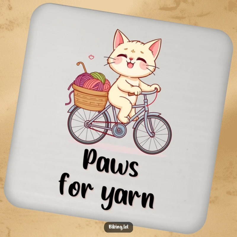Funny drink coaster with a giggling cat riding a bicycle, its yarn basket a symbol of playful spills and humorous protection.