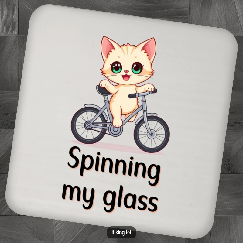 Funny kitten bicycle drink coaster, delighted kitten with wide eyes balancing on a stationary bicycle crank.