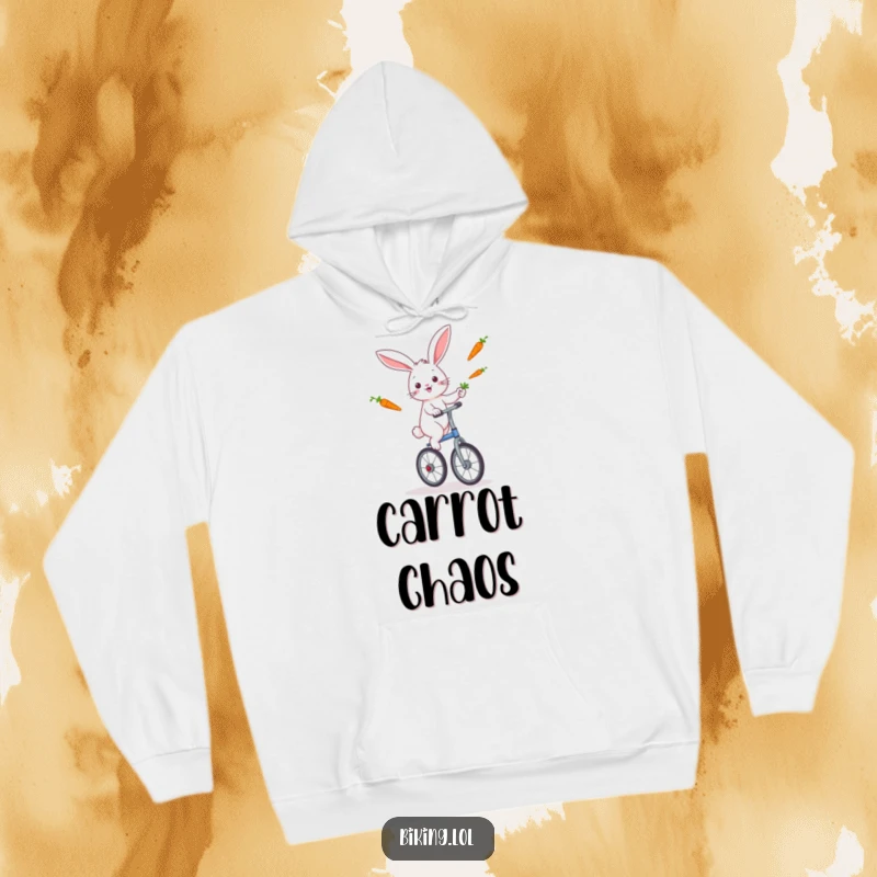 A funny rabbit in mid-juggle with carrots while balancing on a unicycle, featured on a soft hoodie.