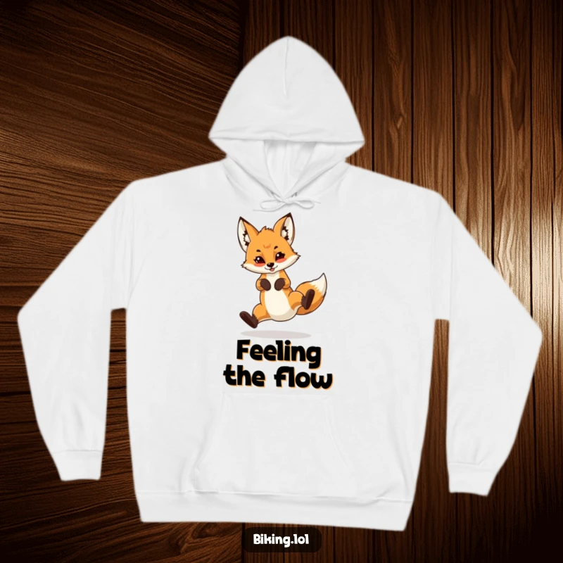 Funny hoodie featuring a confident fox cub performing a skillful wheelie on a bicycle, embodying daring and a flair for excitement.
