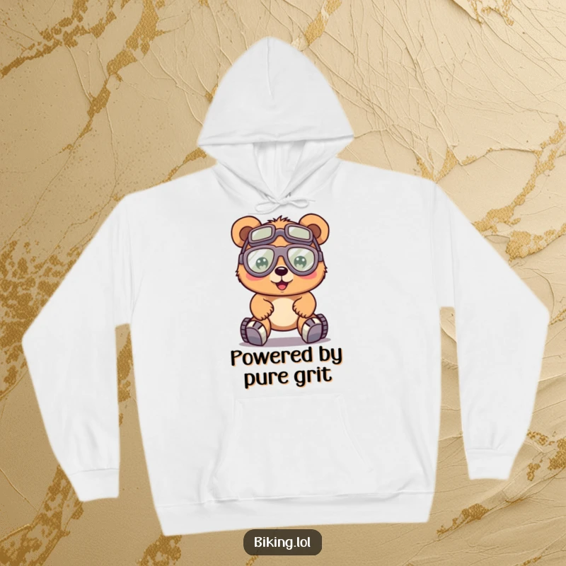 Funny bear with huge goggles, pedaling a bike with effort, on a cozy hoodie, for tough rides.
