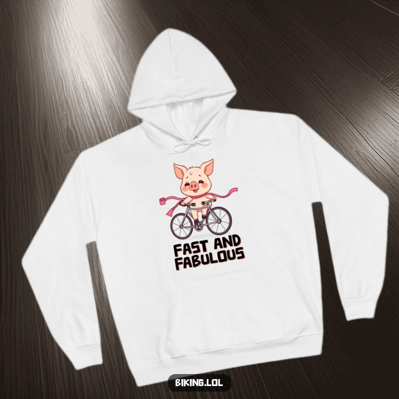 Funny pig character, flushed and exhilarated from a bicycle race, trailing a pink ribbon, featured on a cozy hoodie.