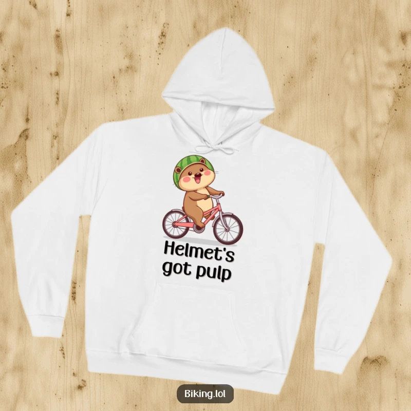 Funny beaver hoodie depicting a cheerful beaver on a bike, creatively using a watermelon as a helmet, perfect for humor lovers.