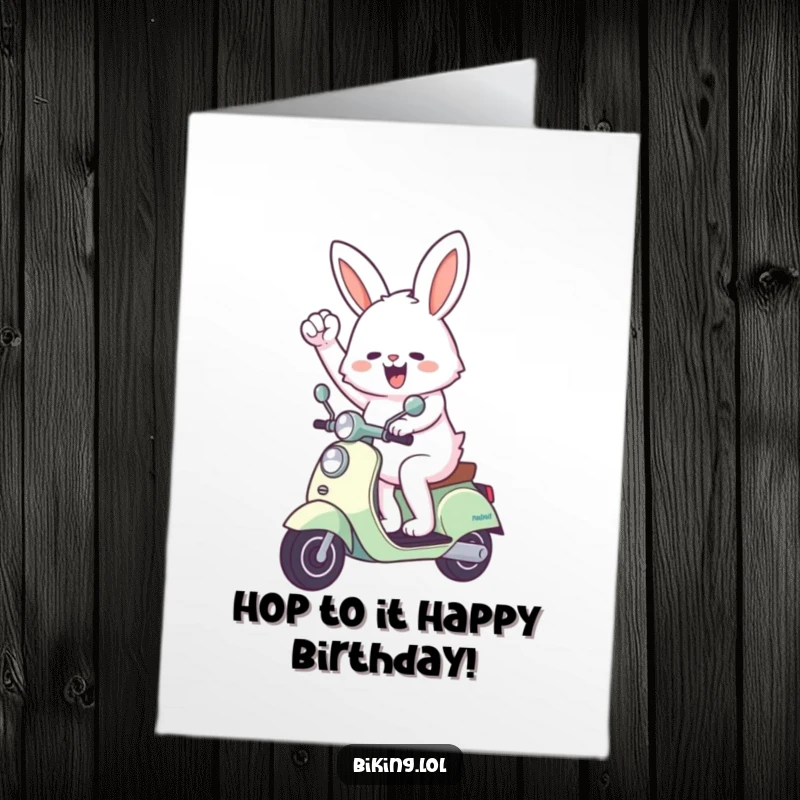 Funny Free Printable Birthday Card: A fluffy bunny rides a scooter, pumping its fist in the air with infectious enthusiasm.