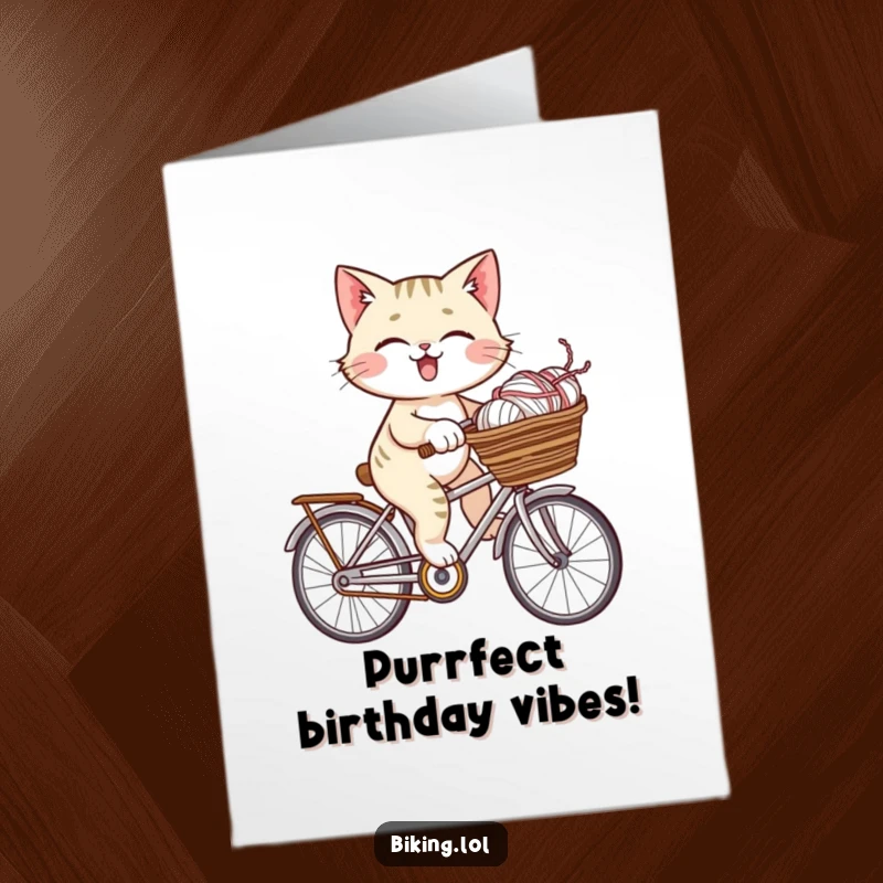 Funny Free Printable Birthday Card: A giggling cat joyfully rides a bicycle laden with a overflowing basket of colorful yarn.