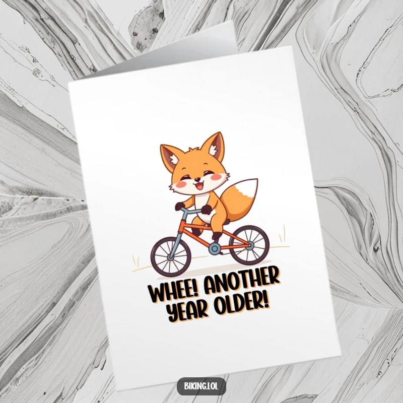 Funny Free Printable Birthday Card: Happy fox joyfully cycling downhill on a tiny bicycle with outstretched paws, spreading birthday cheer.