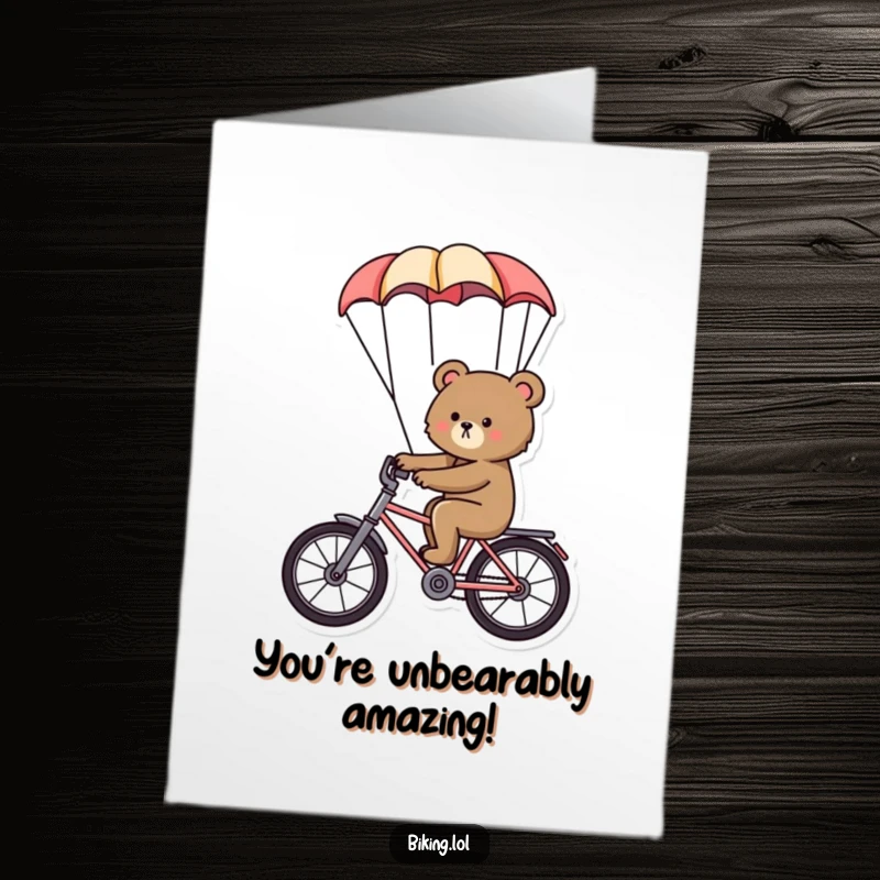 Funny free printable congratulations card of a determined bear riding a bike with a parachute billowing, signifying a successful venture.