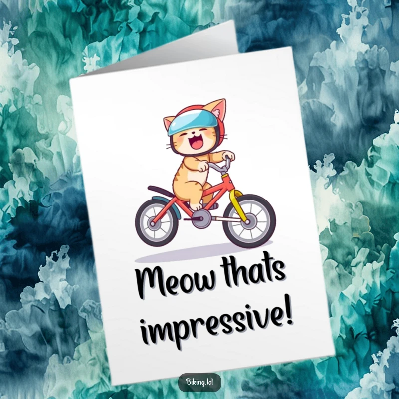 Funny Free Printable Congratulations Card: A helmet-wearing cat beams with joy, balancing perfectly on the back wheel of a bicycle.