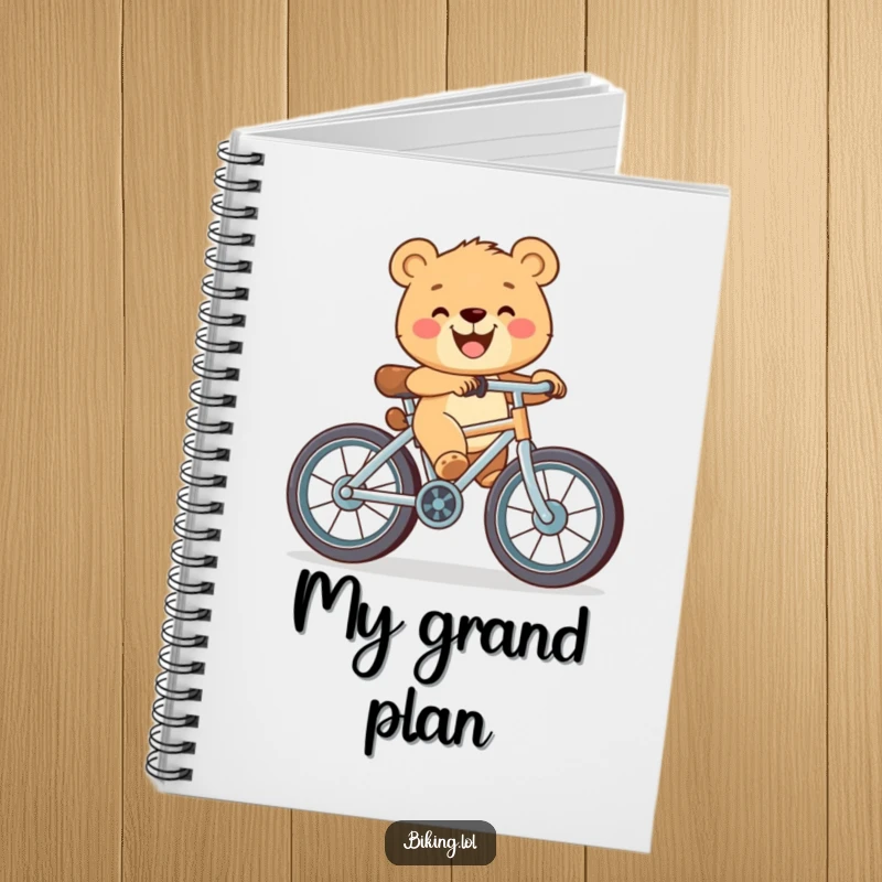 Funny notebook cover featuring a happy bear cub with a wide grin, pedaling a bicycle with oversized wheels, inspiring creativity.