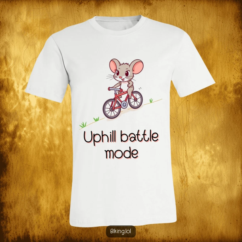 Funny mouse t-shirt showing a brave rodent pedaling a miniature bicycle up a steep hill, a symbol of effort and humor.
