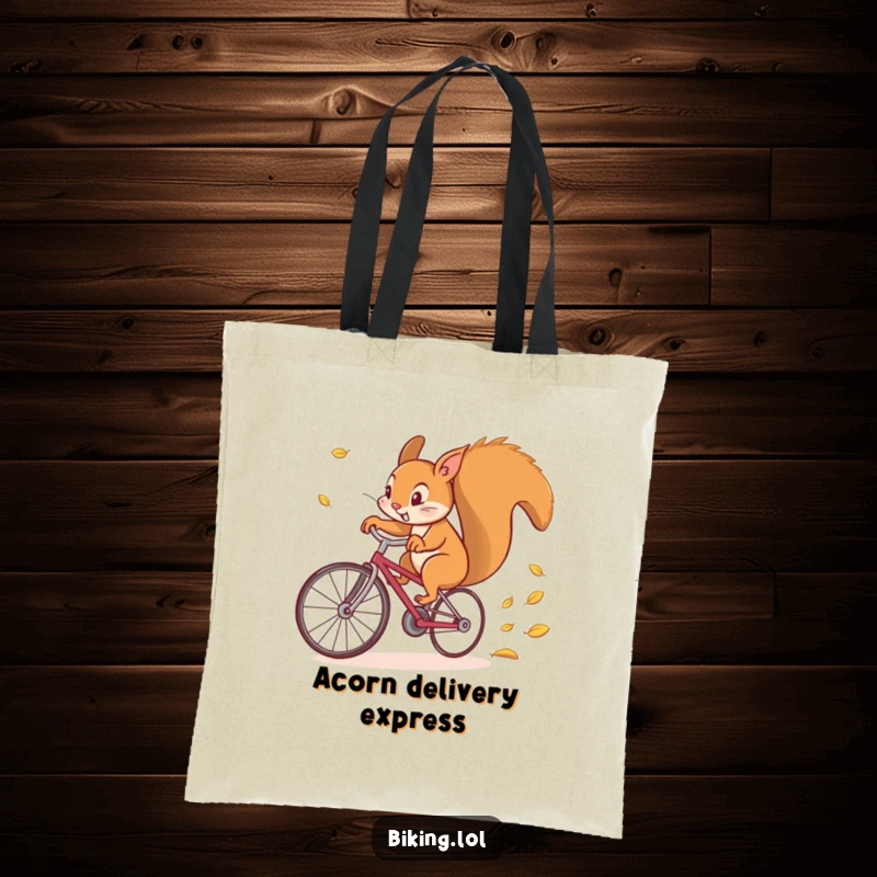 Funny tote bag featuring a determined squirrel comically riding a bicycle at high speed, leaving a trail of leaves in its wake.