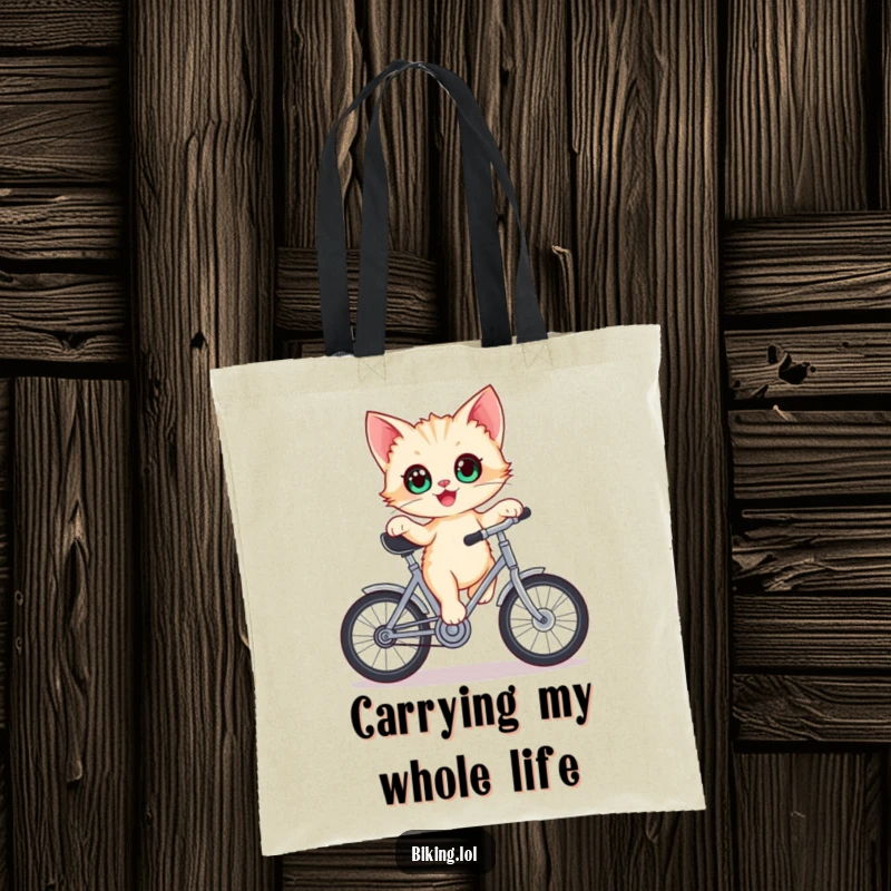 Funny kitten tote bag, delighted kitten with wide eyes balancing on a stationary bicycle crank, ready for adventures.