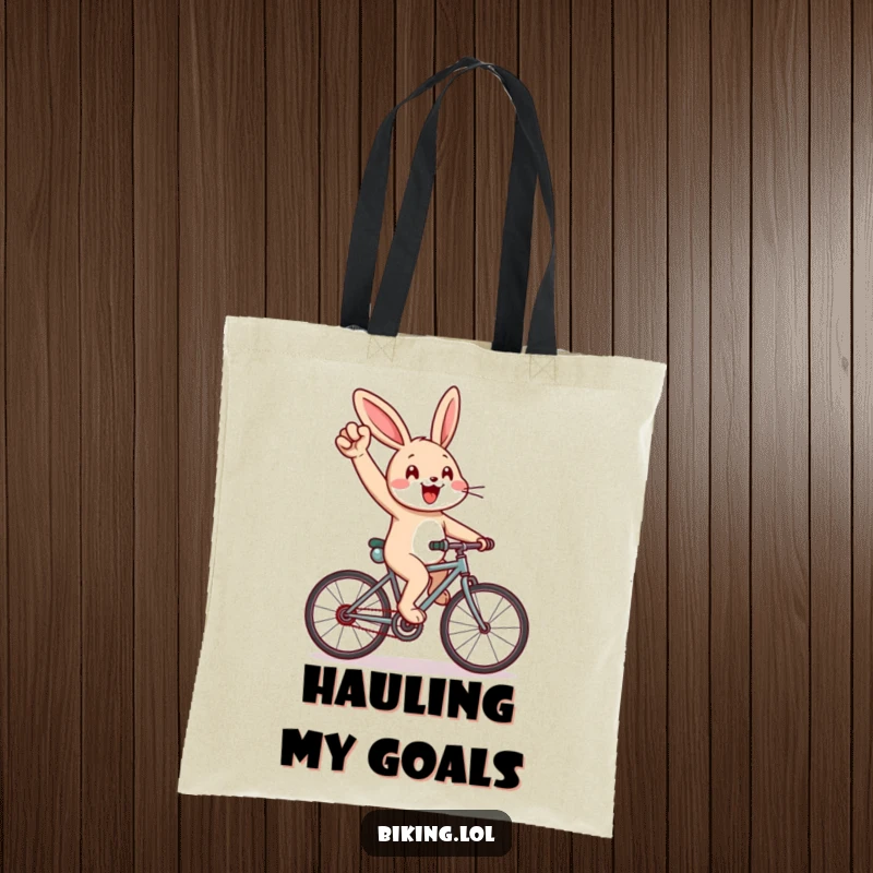 Funny tote bag with a cheerful rabbit cycling uphill, pumping arm, a humorous and practical funny gift.